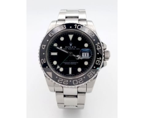 A Rolex GMT - Master II Automatic Gents Watch. Model 116710LN. Stainless steel bracelet and case - 40mm. Black dial with date
