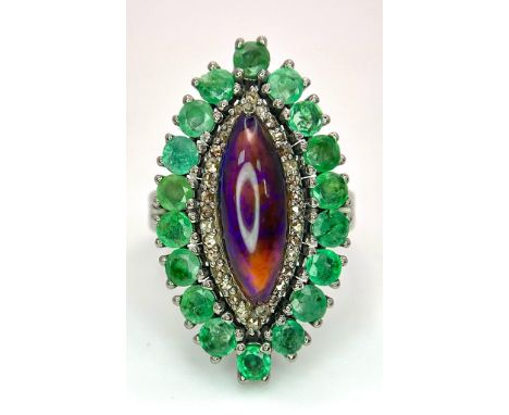 A Black Opal Ring with an Emerald and Diamond Surround on 925 Silver. 2.3ctw emeralds, 0.40ctw diamonds. Size M, 7.20g total 