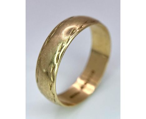 A Vintage 9K Yellow Gold Band Ring. 5mm width. Size K. 1.9g weight. Full UK hallmarks. 