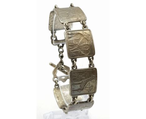 A vintage 925 silver African Safari animal motif square panels design with T-bar link bracelet. Total weight 33.1G. Total len