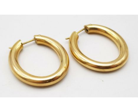 A Classic Pair of Vintage Oval Hoop 9K Yellow Gold Earrings. 6.3g total weight. 