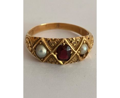 Antique GOLD RING set with Garnet and Seed Pearls. Hallmark rubbed (tests for 18 ct) Size N. 3.6 grams. 