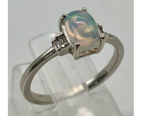 Opal and diamond silver set ring, weight 1.6g size K 