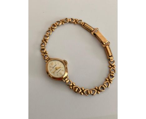 Ladies vintage 9 carat GOLD ACCURIST WRISTWATCH WITH 9 carat GOLD BRACELET STRAP.UK hallmark. Manual winding. Full working or