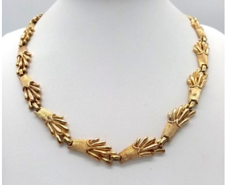 A Vintage 18K Yellow Gold Substantial Harvest-Burst Link Necklace. 44cm length. 66.37g weight. 