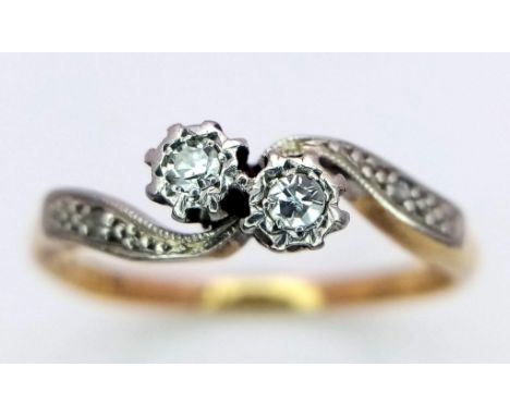 18K YELLOW GOLD DIAMOND TWIST RING - 0.07CT DIAMOND - 2.4G TOTAL WEIGHT - SIZE N 