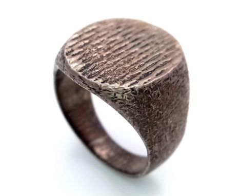 A vintage sterling silver Gentlemen ring. Total weight 15.9G. Size V/W.