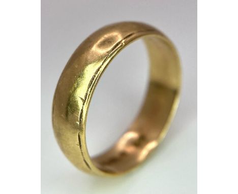 A Vintage 9k Yellow Gold Band Ring. 4mm width. Size J. Full UK hallmarks. 2.16g weight. 