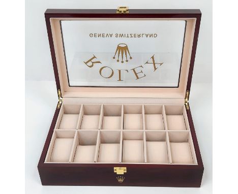 A high-quality wooden watch case for 12 watches (often used by ROLEX and OMEGA dealers) made from highgloss cherry veneer and