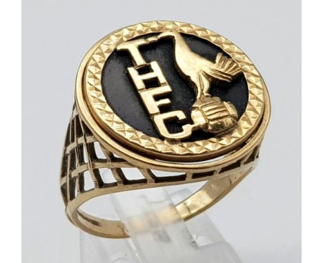 A Vintage 9K Yellow Gold Spurs Football Signet Ring! THFC and Cockerill on black onyx. Size W. 5.93g total weight. 