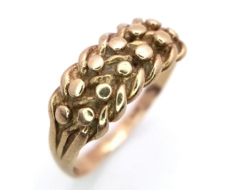 A Vintage 9K Yellow Gold Keeper Ring. Size R. 2.9g weight.