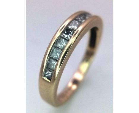 A Vintage 9K Yellow Gold Diamond Half Eternity Ring. 0.50ctw of diamonds. Size N. 2.85g weight. 