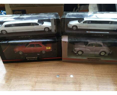 A collection of boxed 1:18 scale boxed diecast vehicles including, Minichamps Ford Escort and Morris minor and 2x Lincoln Lim