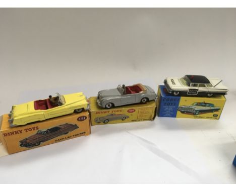 Corgi and Dinky Toys boxed including a Chevrolet police car 481 retro box, Dinky Cadillac tourer 131 retro box and Dinky Toys