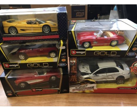 Collection of boxed diecast vehicles 1:18 scale including Burago , Fast and the furious etc