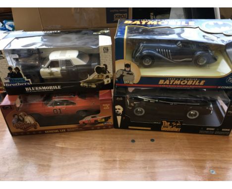 Collection of boxed diecast vehicles 1:18 scale including Blues bros Bluesmobile, DC comics 1940s Batmobile, The Godfather Ca