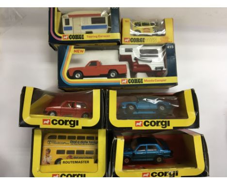 A collection of Corgi boxed vehicles Touring Caravan 490, Wild honey Whizzwheels dragster 164, Mazda Camper 415, Austin Mero 