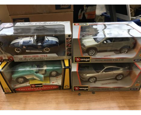 Burago and Cobra 1:18 scale boxed diecast vehicles including BMW, Porsche, Chevrolet and a Shelby Cobra