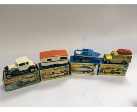 Matchbox boxed Diecast including Model A Ford 73, Superfast caravan 57, Superfast boat on trailer 9 and a Safari Land Rover 1