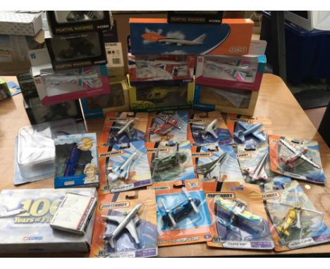 A collection of boxed and carded  diecast aircraft including Matchbox, Corgi etc