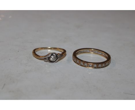 An 18ct gold eternity ring set with white stones (one stone missing) approx. weight 3.2g ring size R, An 18ct gold diamond se