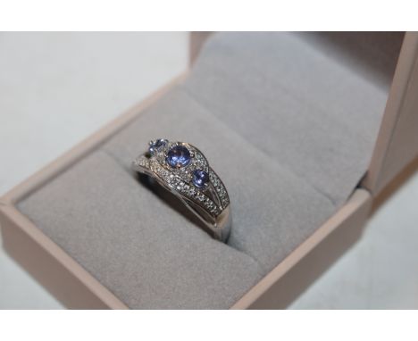 A Sterling silver tanzanite and diamond ring, ring size Q/R