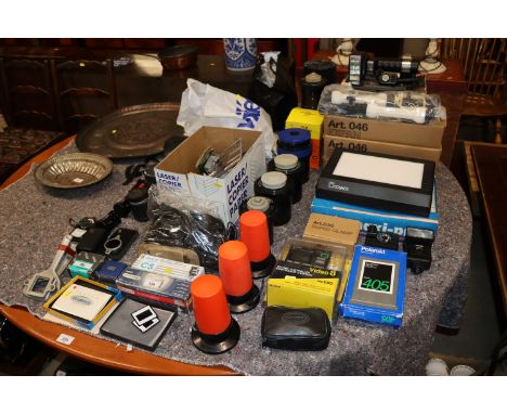 A large quantity of various camera related items to include flash units editing controller, tanks, a Maxi-Dash Pro Profession