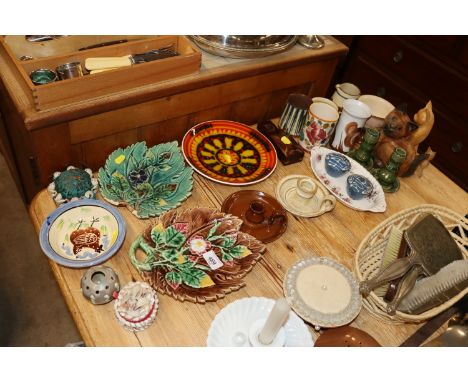 A quantity of various decorative china to include Majolica style leaf plates, candlesticks, mottle ware jug, wooden cats, pot