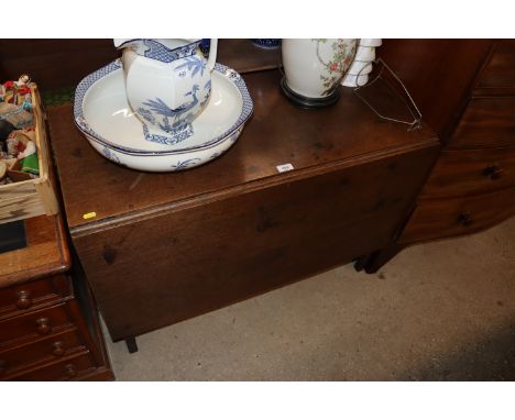 A 19th Century oak gate leg table 