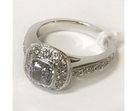 PLATINUM SOLITAIRE RING WITH A CUSHION CENTRE HALF CARAT CENTRE TOTAL 0.90 CARATS - SIZE F
