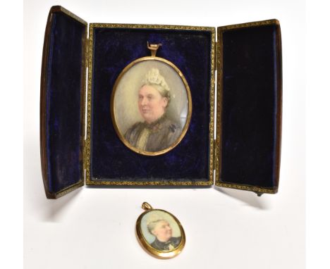 A YELLOW GOLD OVAL PORTRAIT LOCKET  portrait of a Victorian lady, painted on ivory, to yellow gold surround, with compartment