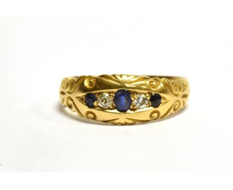 AN 18 CARAT GOLD SAPPHIRE AND DIAMOND 5 STONE BOAT HEAD RING scroll decoration, hallmarked 18 carat gold 1900, ring size K ½,