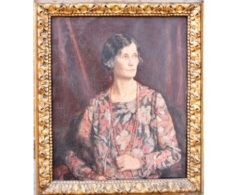 BRITISH SCHOOL (EARLY 20TH CENTURY)  Half length portrait of a lady,  oil on canvas, unsigned, 75cm x 62cm.