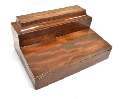 AN VICTORIAN BRASS MOUNTED MAHOGANY WRITIG SLOPE  the caddy top with secret spring loaded compartment, opening to fitted lift