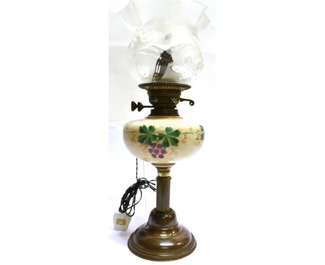 AN EDWARDIAN OIL LAMP CONVERTED TO TABLE LAMP  with opaque glass reservoir and frosted and clear glass shade, 61cm high inclu