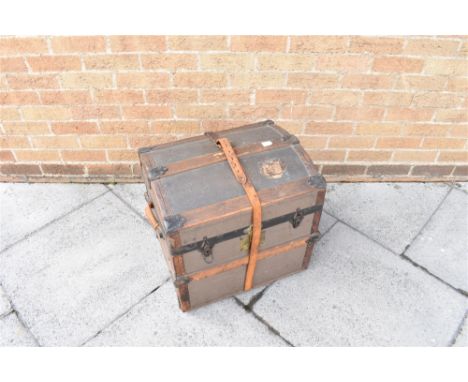 A SMALL VICTORIAN LEATHER BOUND DOME TOP TRUNK  with original lift-out fitted interior, 54cm wide 43cm deep 51cm high