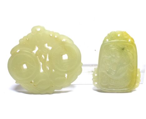 TWO CHINESE CARVED AND RETICULATED JADE PLAQUES  one carved to each side with a dragon, the other with coins, a bat and peach