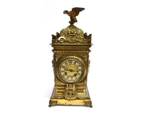 A CONTINENTAL BRASS CASED MANTLE CLOCK  with eagle surmount, the 8-day movement striking on a coiled gong, stamped 'Japy Frer