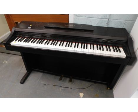 A Casio Celviano electric keyboard, AP-21. 