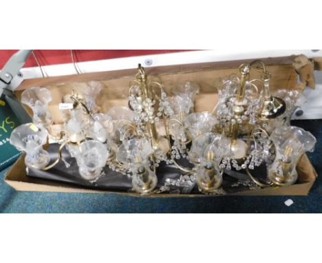 A pair of brass and glass five branch light fittings, and another similar. 