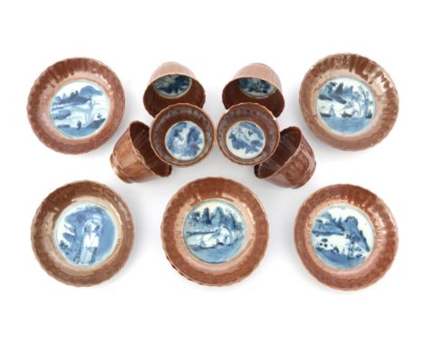  Six Chinese porcelain Batavia ware cups and saucers with blue and white landscape decoration, Qianlong period. Defects. Diam