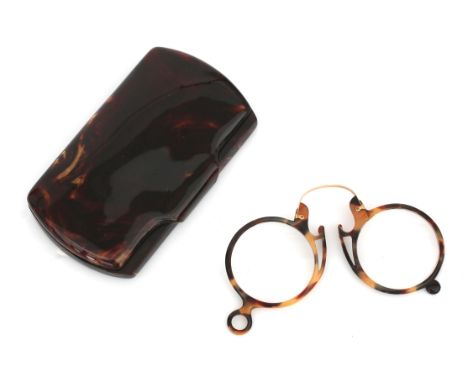 A tortoise and gilded mounted pince-nez in tortoise shell case, adress sticker: Wilh. B.A. Gunther, Dordrecht, first quarter 