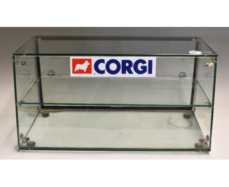 Corgi Toys Glass Display Cabinet with glass sides and front with shelf to inside and two sliding doors to rear, length 60cm.