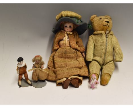 Early 20th Century Bisque Head Doll having bisque arms and wooden legs, with two small dolls with ceramic head, hands and leg