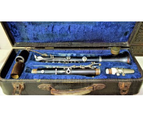 A Regent ebony clarinet by Boosey &amp; Hawkes, cased