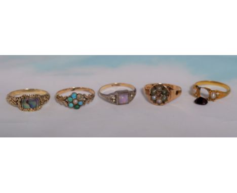 A Victorian ornate abalone set ring, unmarked, tests as 14K plus, 2.2 g; a 15 carat ring set seed pearls, 2.6 gm; a turquoise