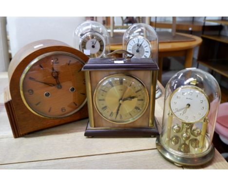 Two 1930's oak mantel clocks with strike; 3 modern 400 day clocks; a gilt mantel clock; 2 warming pans