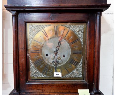 A mid-18th century oak longcase clock, the square top hood with side pillars, full length door, square brass dial and 8 day m