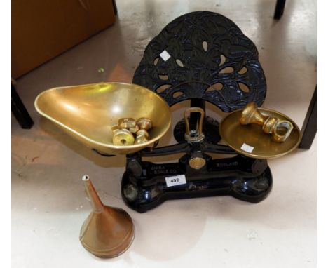 A Victorian style pair of brass and iron kitchen scales; a vintage Bush radio