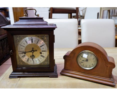 A mid-20th century mahogany Georgian style bracket clock with chiming movement; an Edwardian inlaid mantel clock